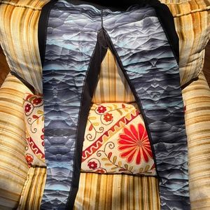 Zella leggings with pattern on front and lower back of leg.